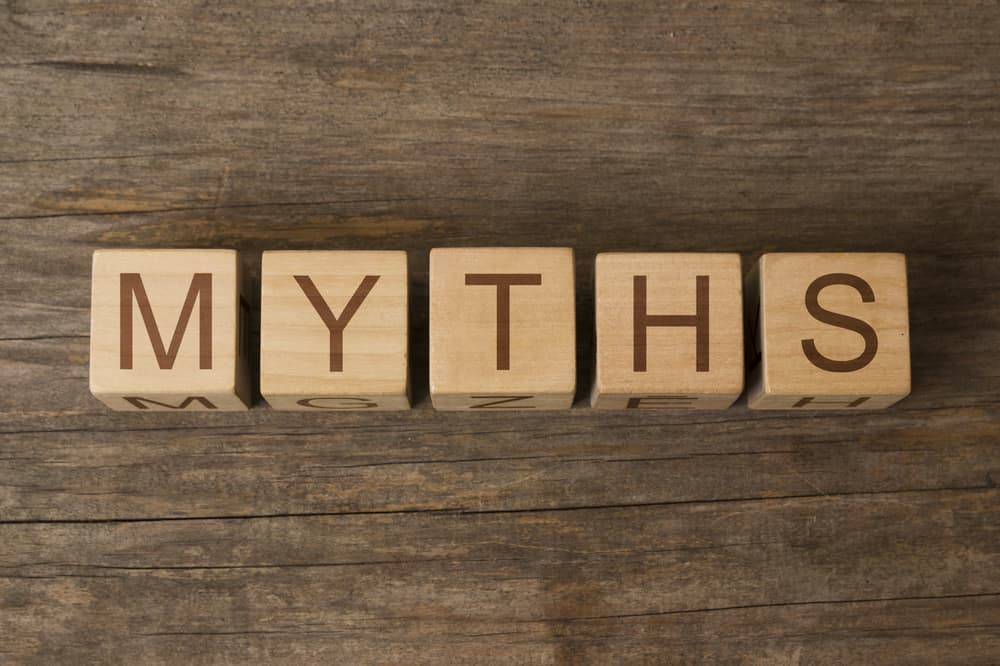word myths on wooden cubes