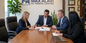 Max Alavi discussing parts of a trust to a man and woman who are siblings.